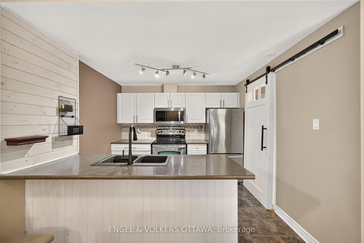 Photo 12 at 4 - 165 Waterbridge Drive, Nepean (Barrhaven East), Ottawa