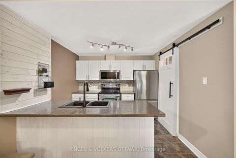 Photo 12 at 4 - 165 Waterbridge Drive, Nepean (Barrhaven East), Ottawa