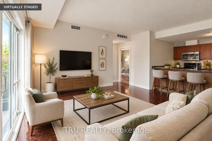 Photo 2 at 7 - 165 Waterbridge Drive, Nepean (Barrhaven East), Ottawa