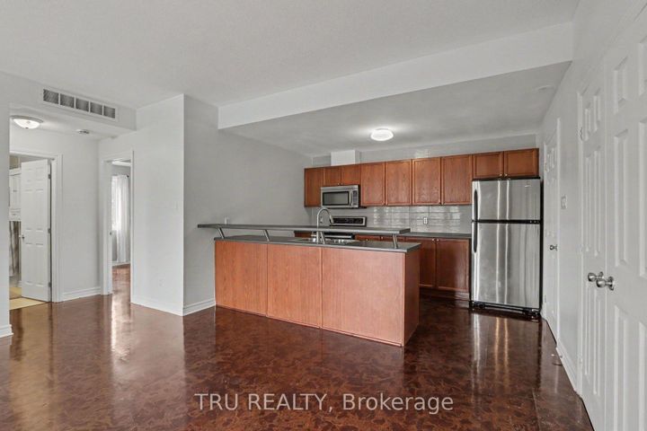 Photo 4 at 7 - 165 Waterbridge Drive, Nepean (Barrhaven East), Ottawa