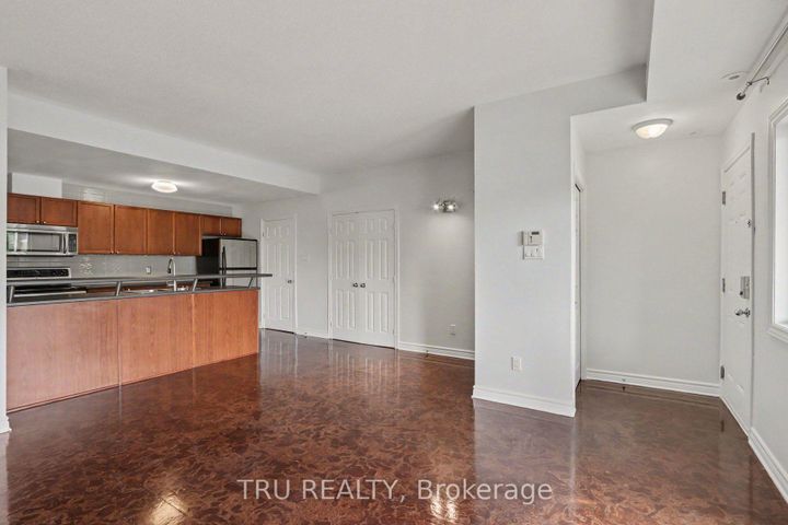 Photo 5 at 7 - 165 Waterbridge Drive, Nepean (Barrhaven East), Ottawa