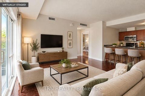 Photo 2 at 7 - 165 Waterbridge Drive, Nepean (Barrhaven East), Ottawa