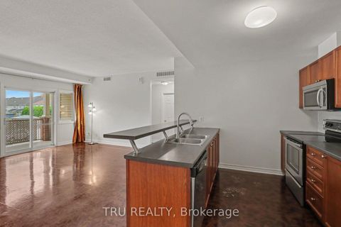 Photo 7 at 7 - 165 Waterbridge Drive, Nepean (Barrhaven East), Ottawa