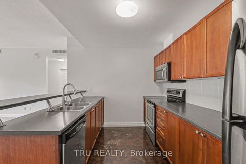 Photo 9 at 7 - 165 Waterbridge Drive, Nepean (Barrhaven East), Ottawa