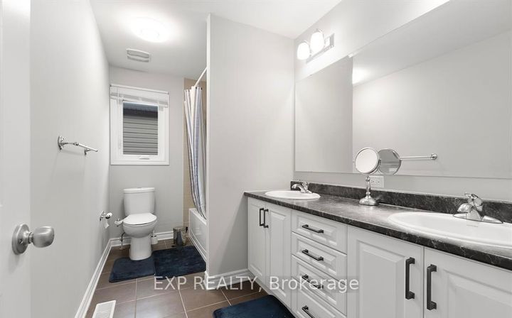 Photo 23 at 12 Knockaderry Crescent, Nepean (Half Moon Bay), Ottawa