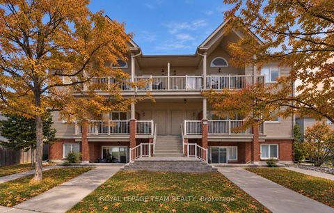 Photo 1 at 9 - 165 Waterbridge Drive, Nepean (Barrhaven East), Ottawa